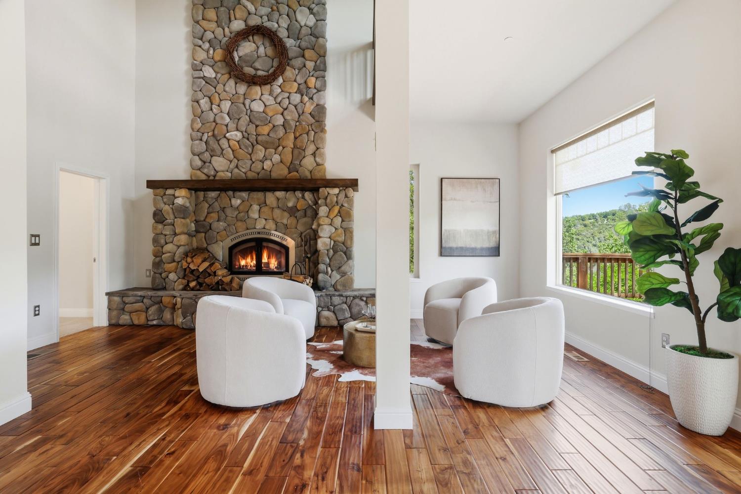 2213 Old Toll Road Placerville, CA 95667 - Photo 72 of 77 a living room with furniture and a fireplace