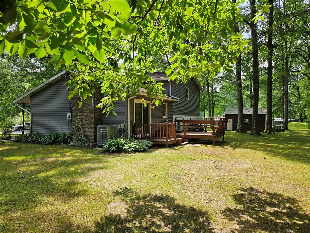 139 Sunset Road Grove City, PA 16127 - Photo 2 of 48 a backyard of a house with table and chairs