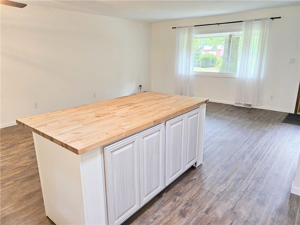 139 Sunset Road Grove City, PA 16127 - Photo 21 of 48 an empty room with wooden floor and window