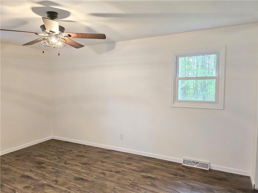 139 Sunset Road Grove City, PA 16127 - Photo 33 of 48 a view of a room with wooden floor fan and window