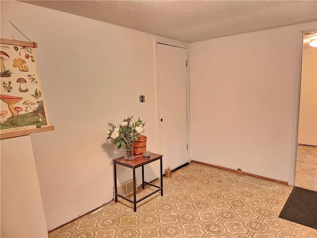 139 Sunset Road Grove City, PA 16127 - Photo 42 of 48 a view of wooden floor and a table in a room