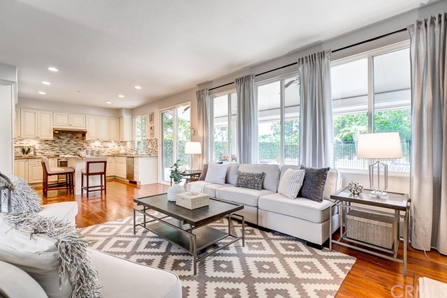 24 Silveroak Irvine, CA 92620 - Photo 16 of 49 a living room with furniture and a table