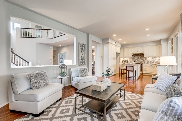 24 Silveroak Irvine, CA 92620 - Photo 17 of 49 a living room with furniture and kitchen view