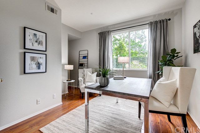 24 Silveroak Irvine, CA 92620 - Photo 21 of 49 a living room with furniture and a large window