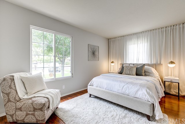 24 Silveroak Irvine, CA 92620 - Photo 24 of 49 a bedroom with a bed couch and window