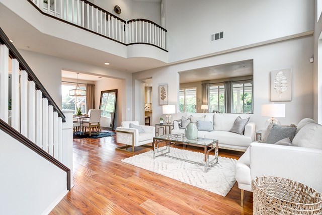 24 Silveroak Irvine, CA 92620 - Photo 3 of 49 a living room with furniture or couch and a wooden floor