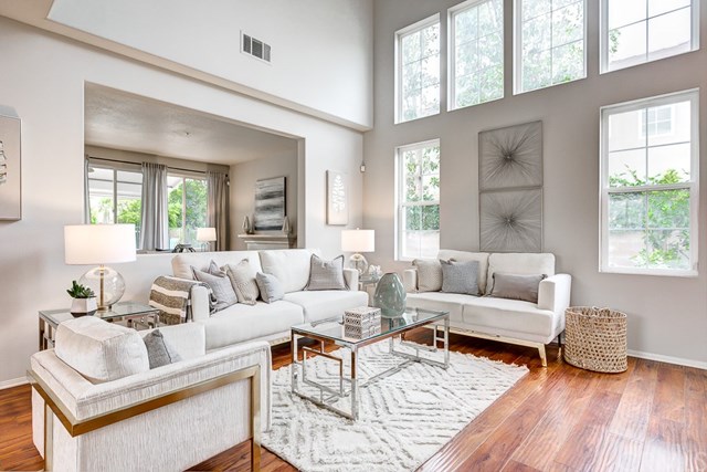 24 Silveroak Irvine, CA 92620 - Photo 4 of 49 a living room with furniture and a large window