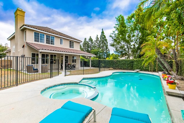 24 Silveroak Irvine, CA 92620 - Photo 43 of 49 a view of a house with a swimming pool