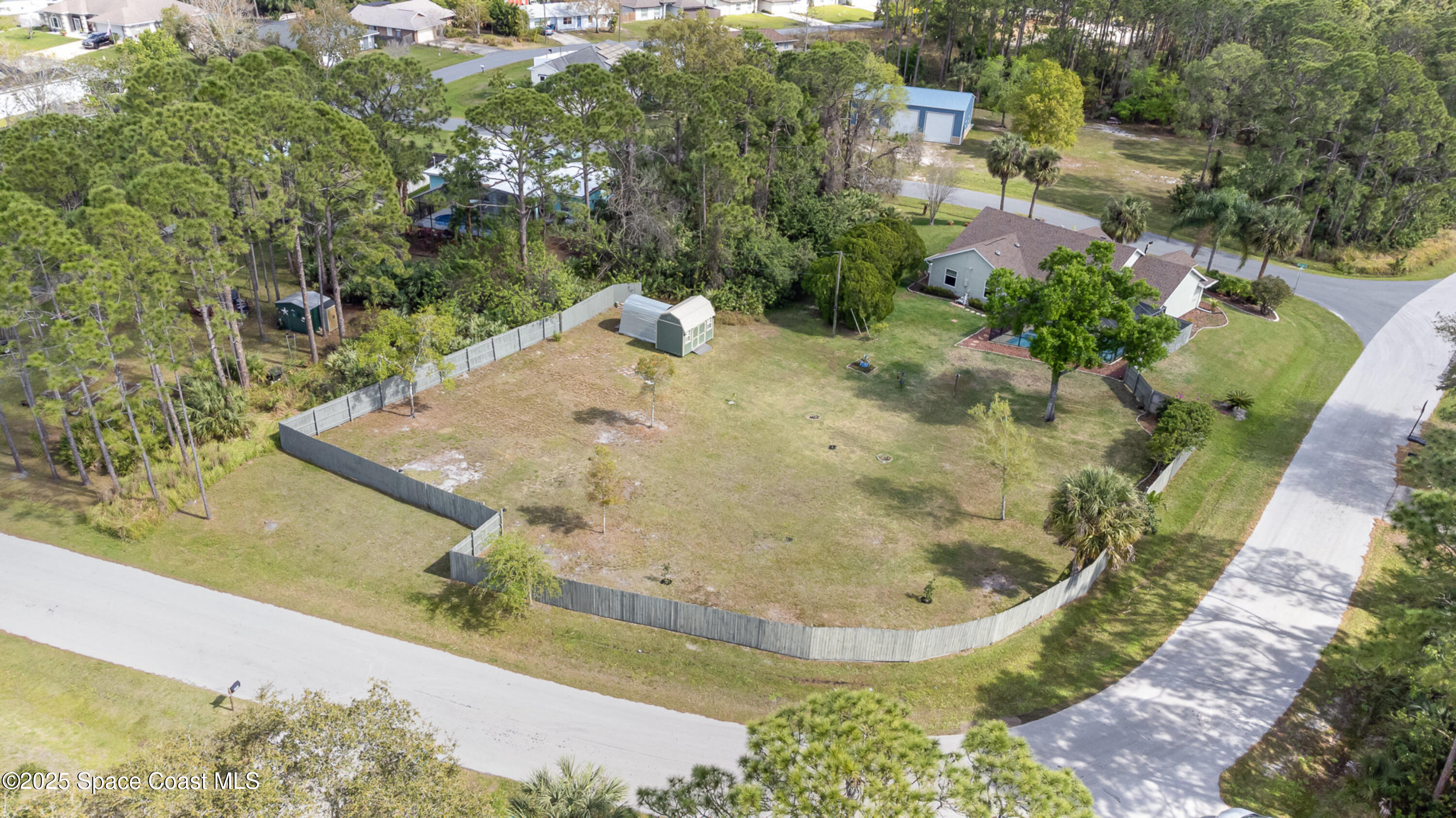 1898 Dragon Road Southeast Palm Bay, FL 32909 - Photo 5 of 40 Aerial - Back Yard