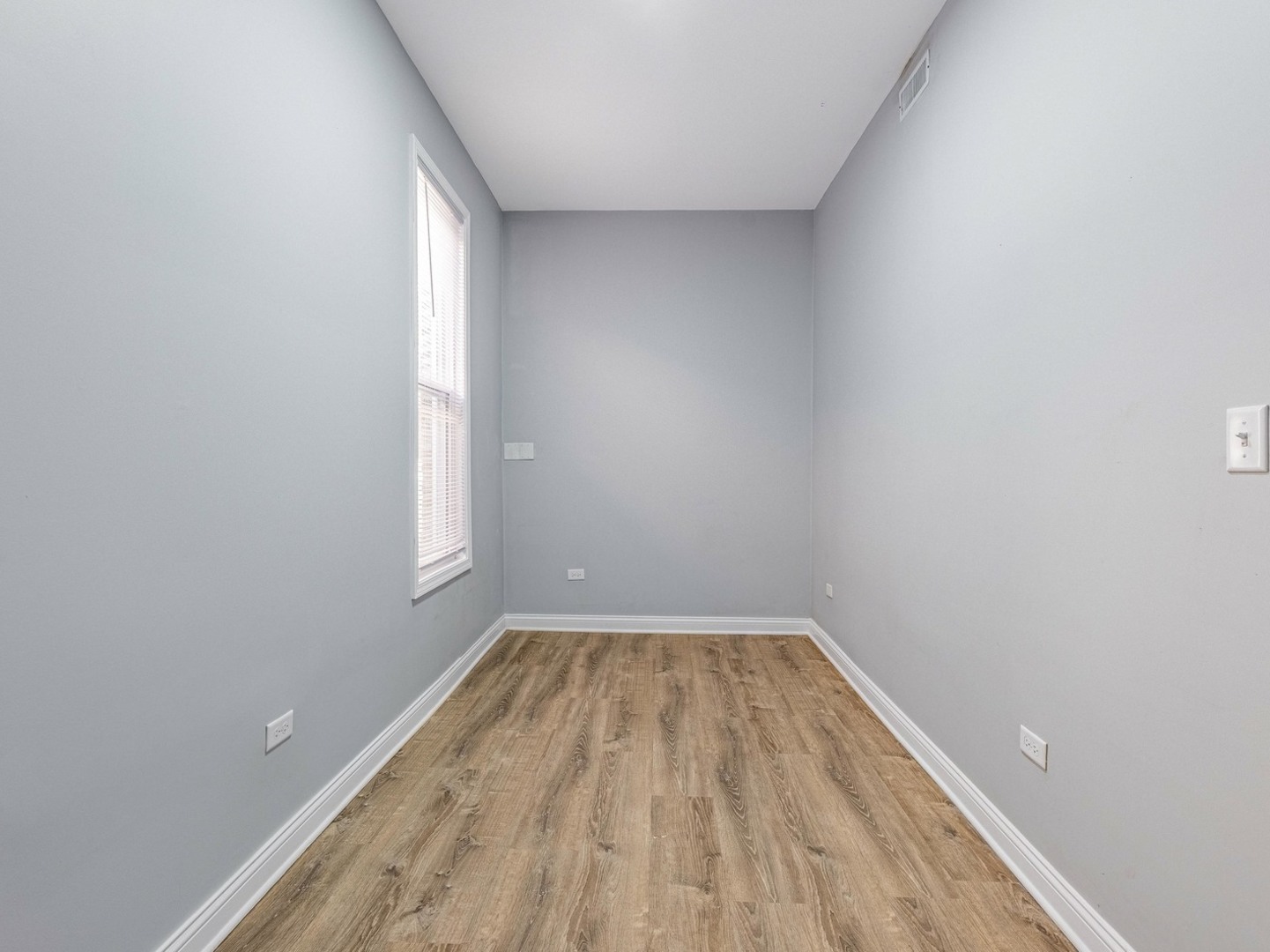 1621 West Cullerton Street, Unit 2 Chicago, IL 60608 - Photo 13 of 17 a view of room with window