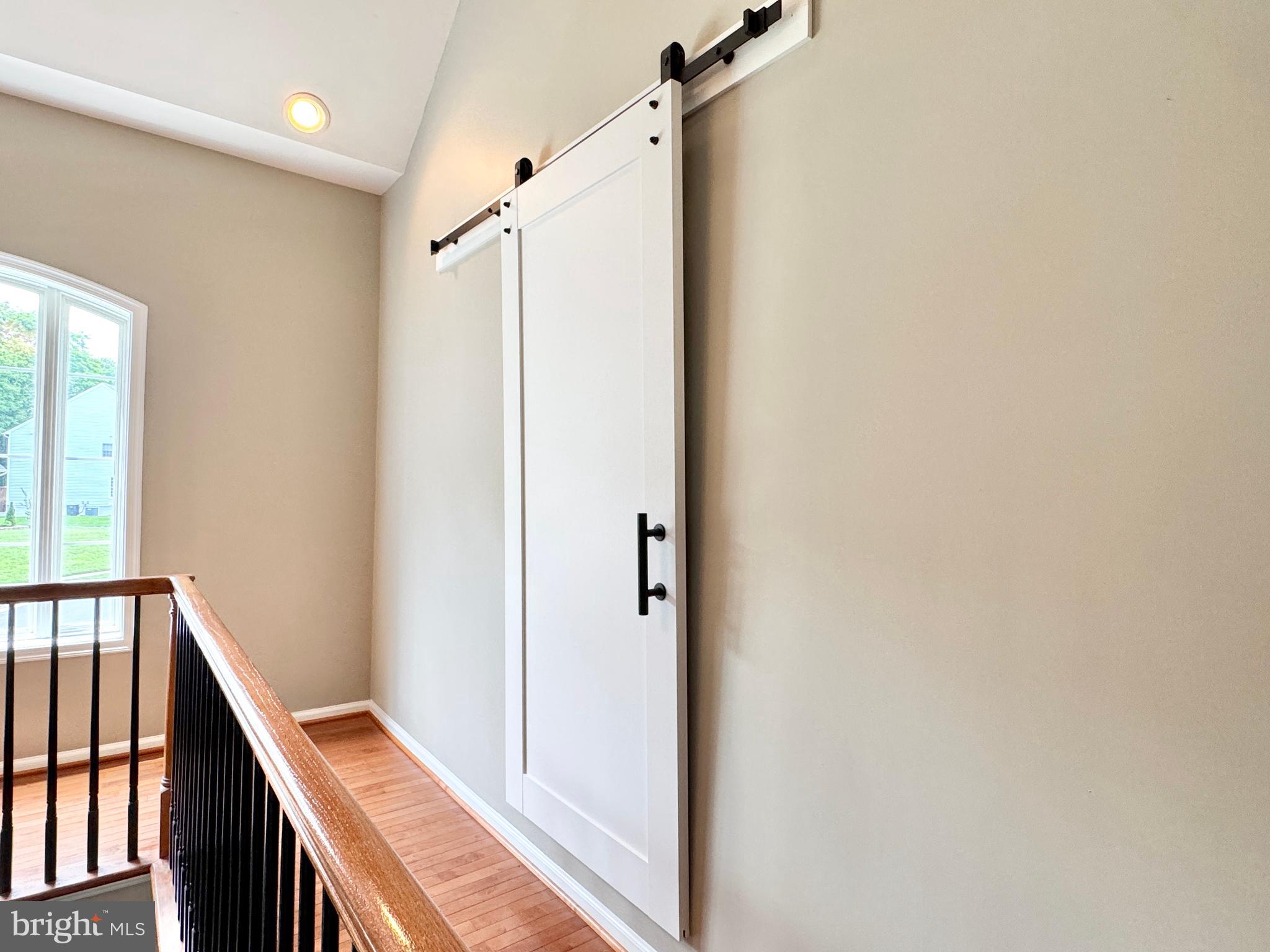 3500 Germainia Court Triangle, VA 22172 - Photo 26 of 77 a view of a hallway with wooden floor and staircase
