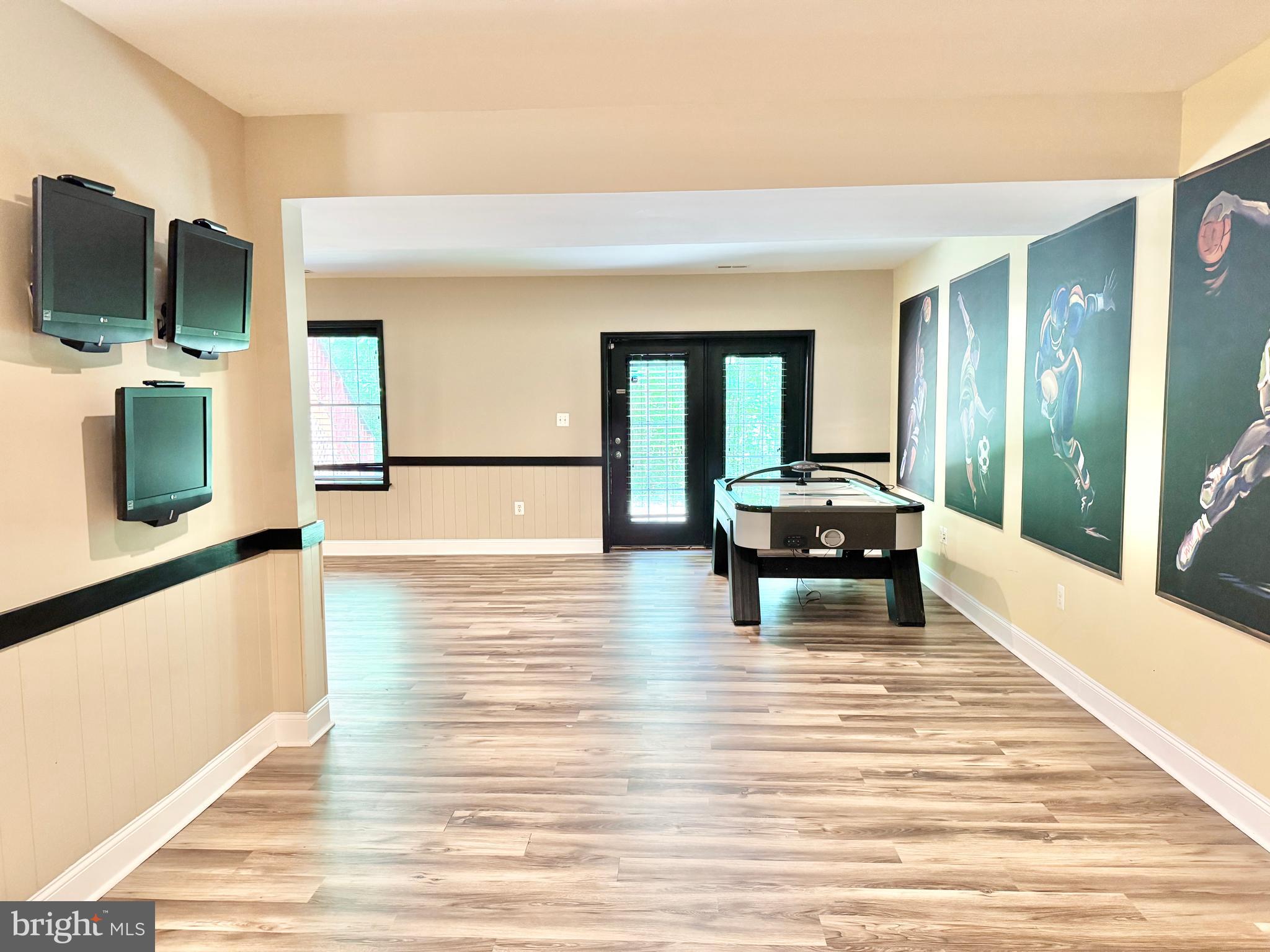 3500 Germainia Court Triangle, VA 22172 - Photo 61 of 77 a living room with furniture and a flat screen tv