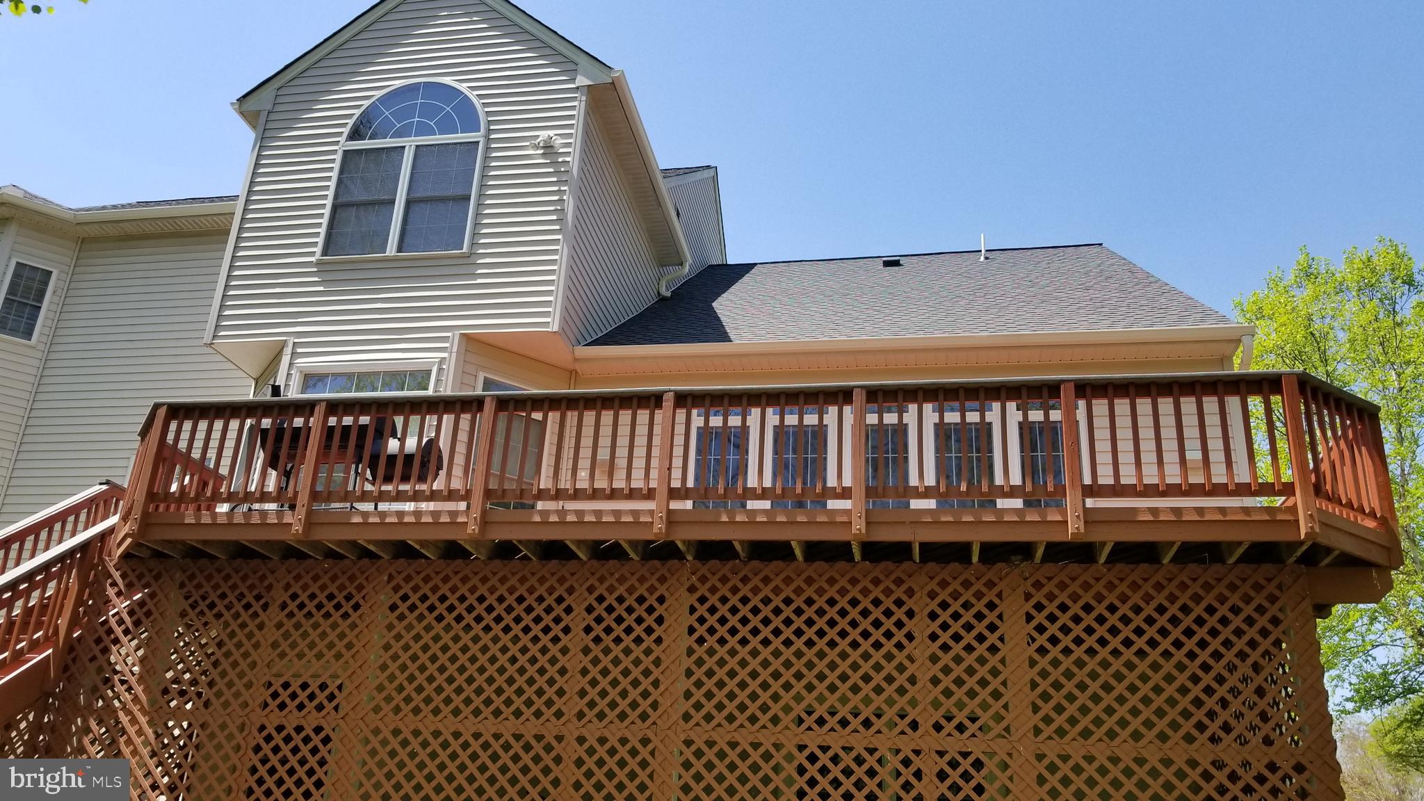 3500 Germainia Court Triangle, VA 22172 - Photo 76 of 77 a view of a wooden deck with a bench