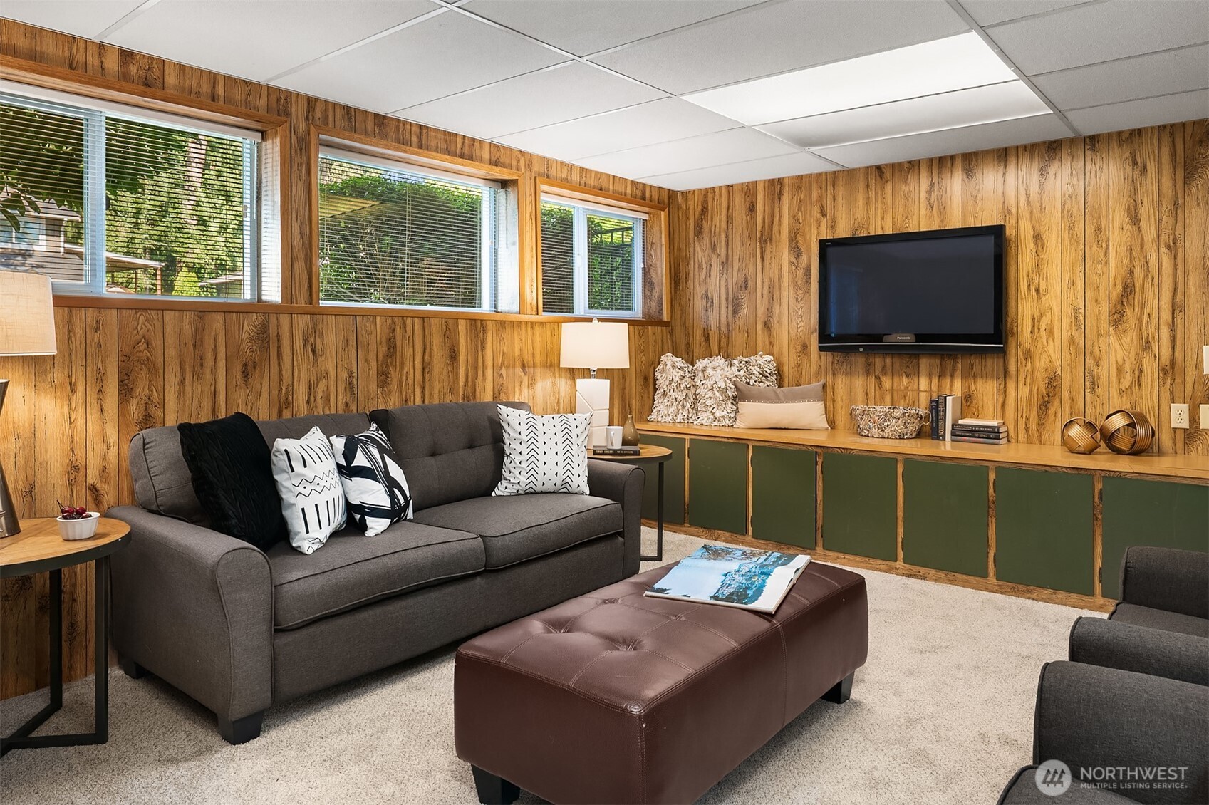 21331 2nd Avenue Southeast Bothell, WA 98021 - Photo 23 of 34 a living room with furniture and a flat screen tv