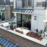 a view of a balcony with chairs