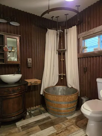 a floor to ceiling window with a rug