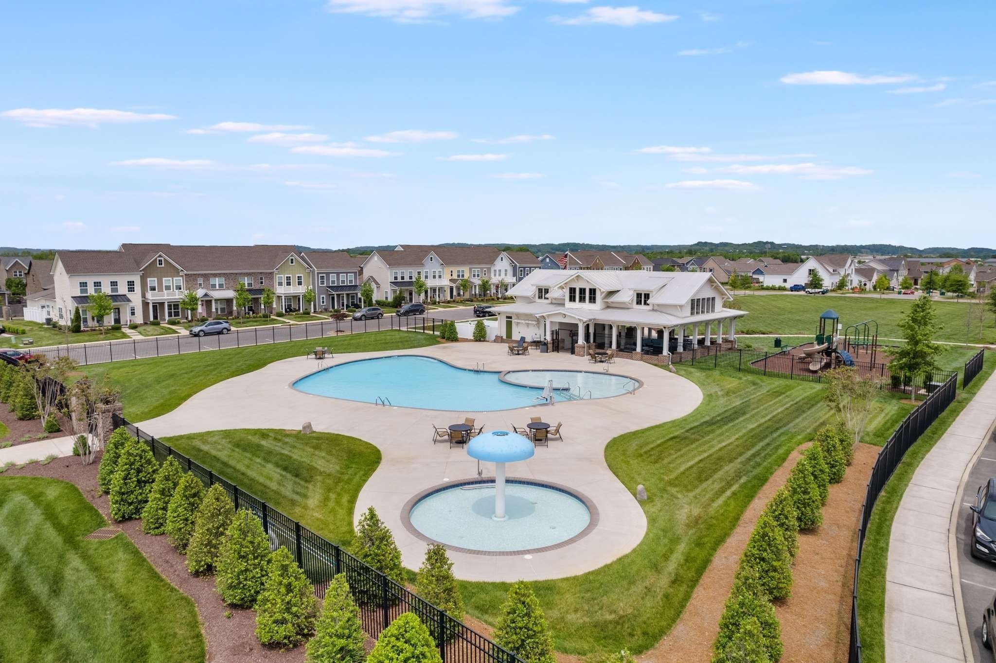 1146 June Wilde Ridge Spring Hill, TN 37174 - Photo 13 of 18 a view of a swimming pool with a table and chairs