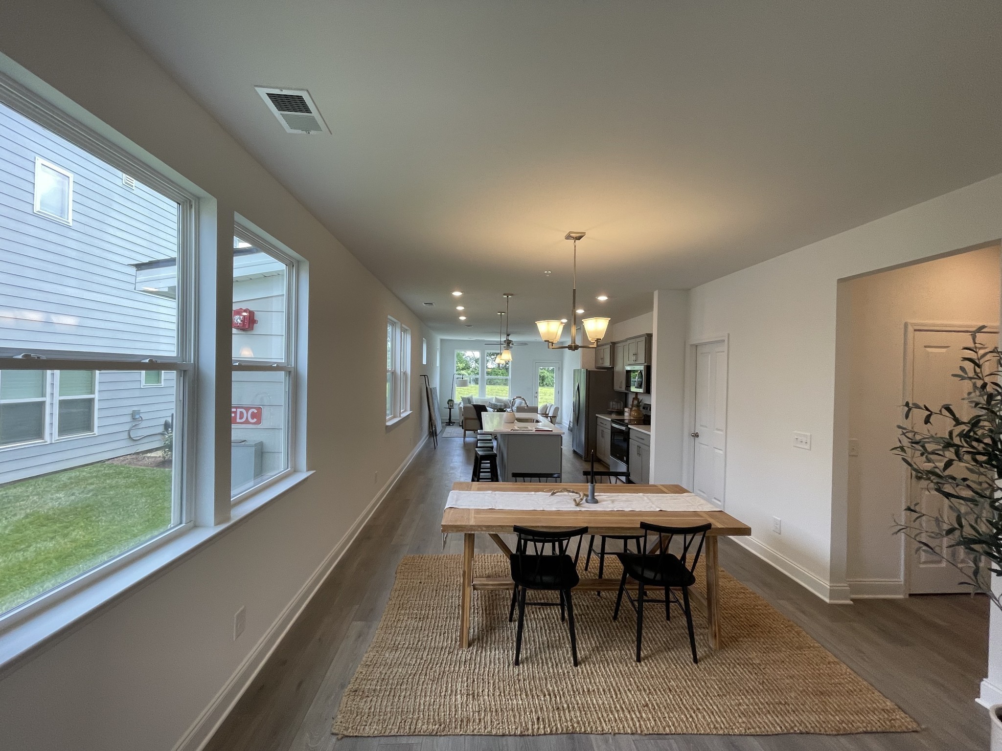 1146 June Wilde Ridge Spring Hill, TN 37174 - Photo 2 of 18 a dining room with furniture and window