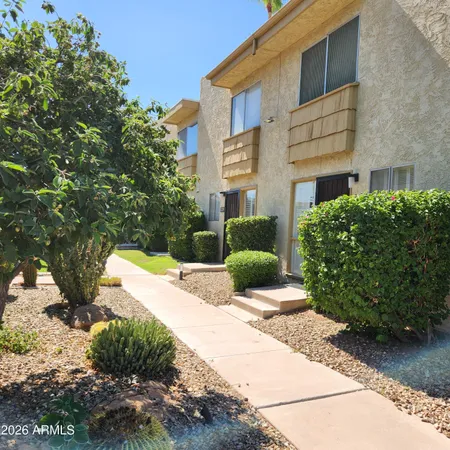 a view of a building with a street