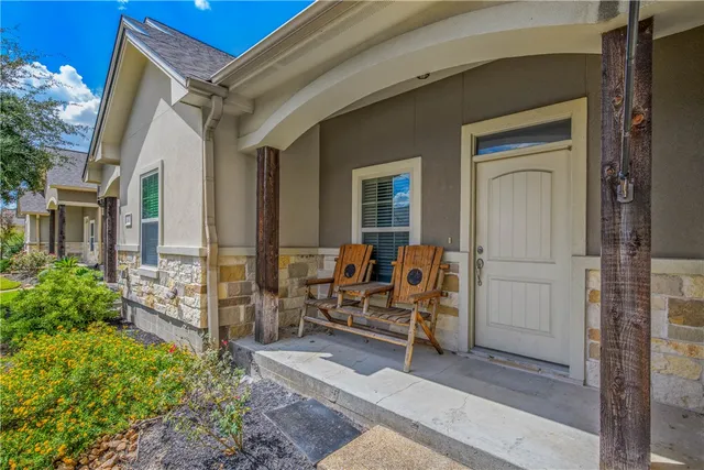 a view of living room filled with furniture