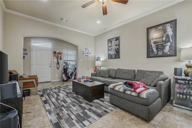 a living room with furniture and a couch