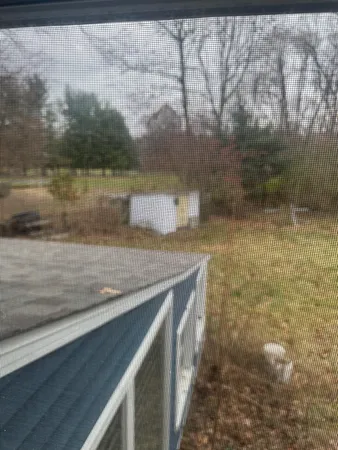 a view of a porch of a house