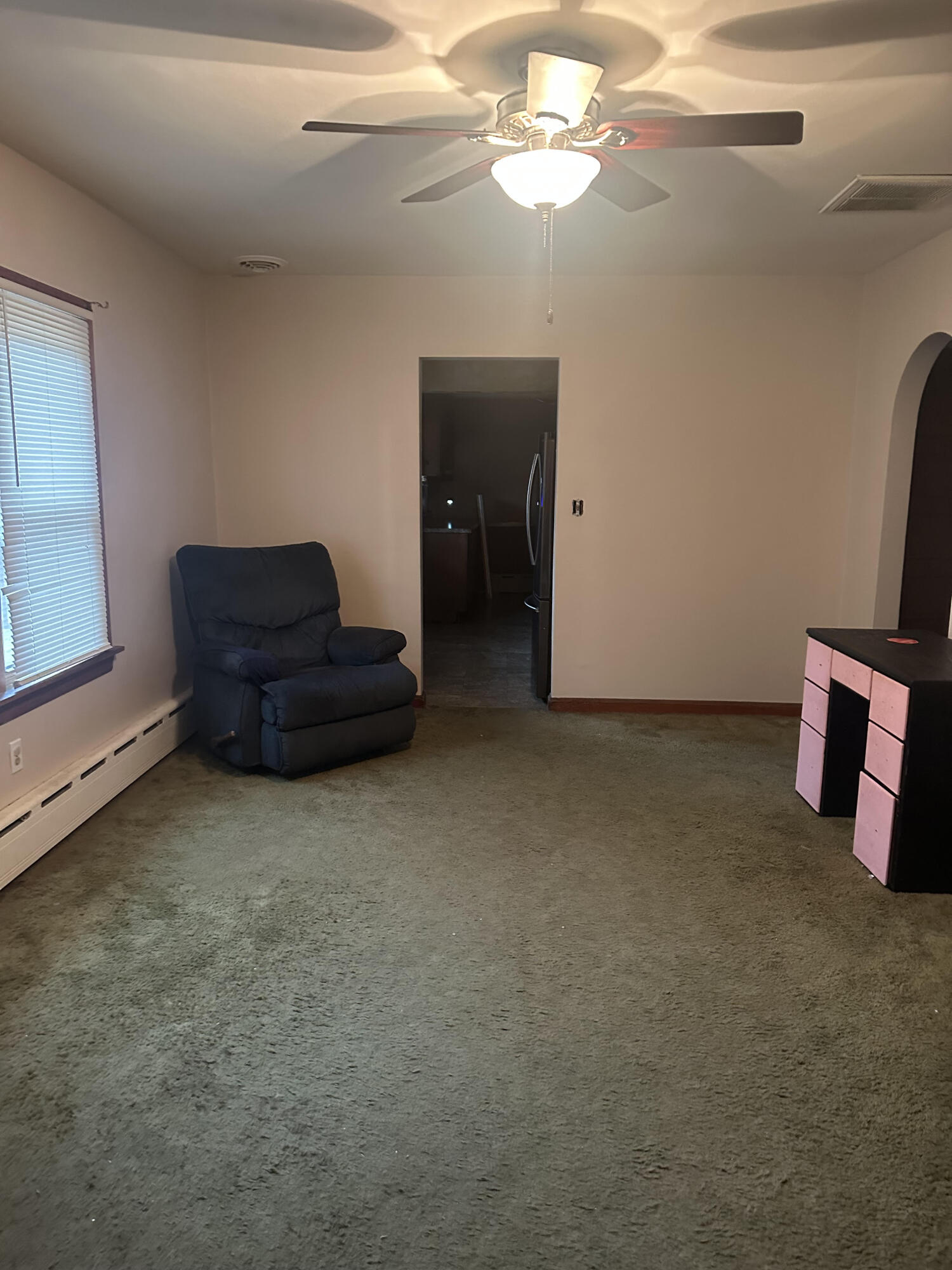 5489 Clem Road Portage, IN 46368 - Photo 17 of 48 a living room with furniture and a chandelier