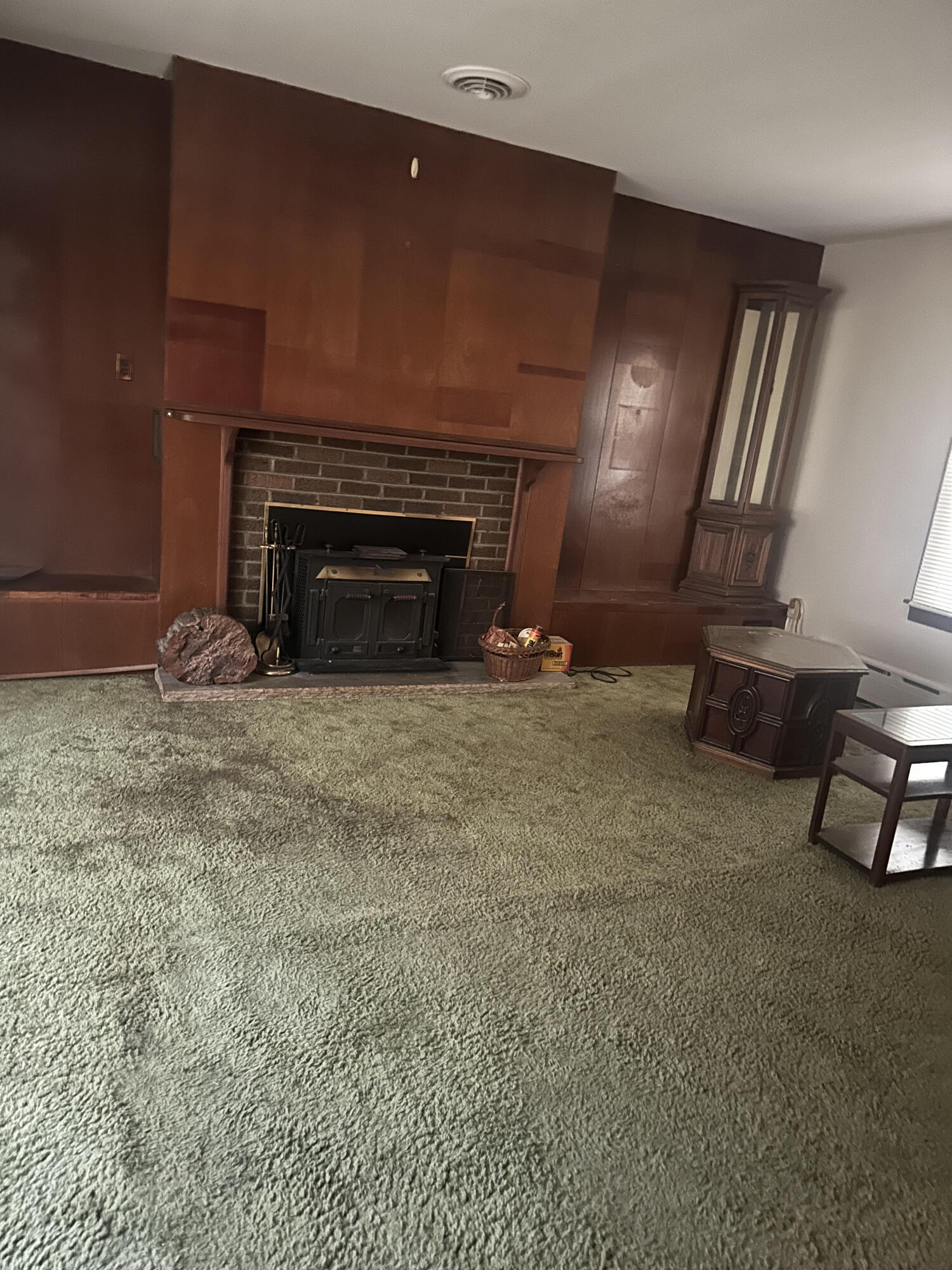 5489 Clem Road Portage, IN 46368 - Photo 21 of 48 a living room with furniture and a fireplace