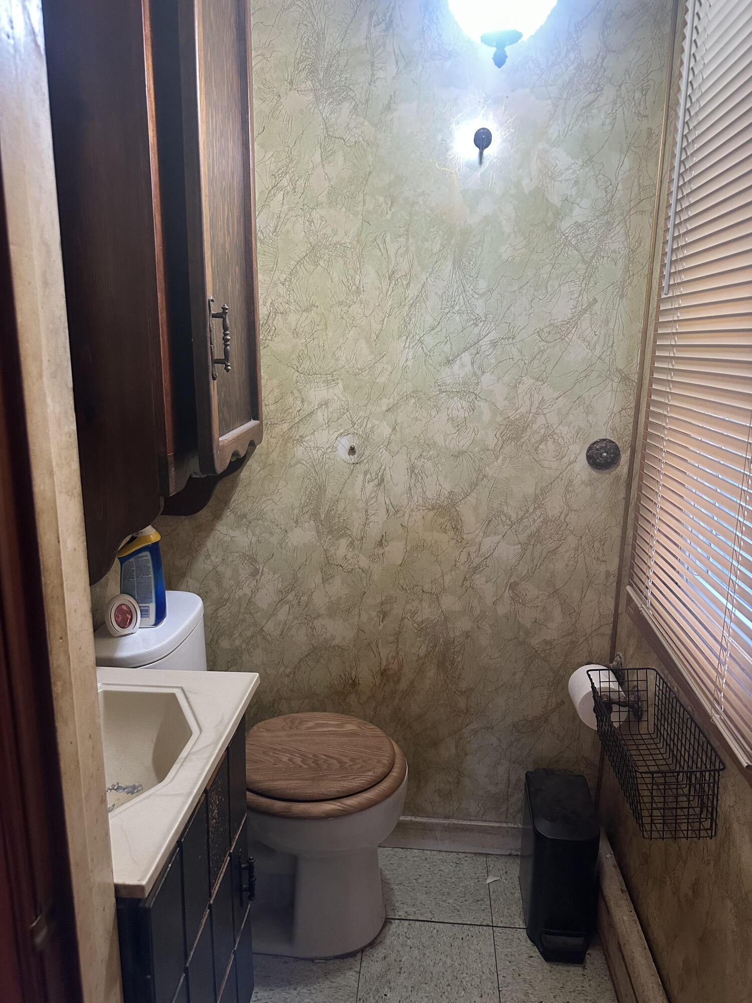 5489 Clem Road Portage, IN 46368 - Photo 26 of 48 a bathroom with a sink a toilet and a mirror