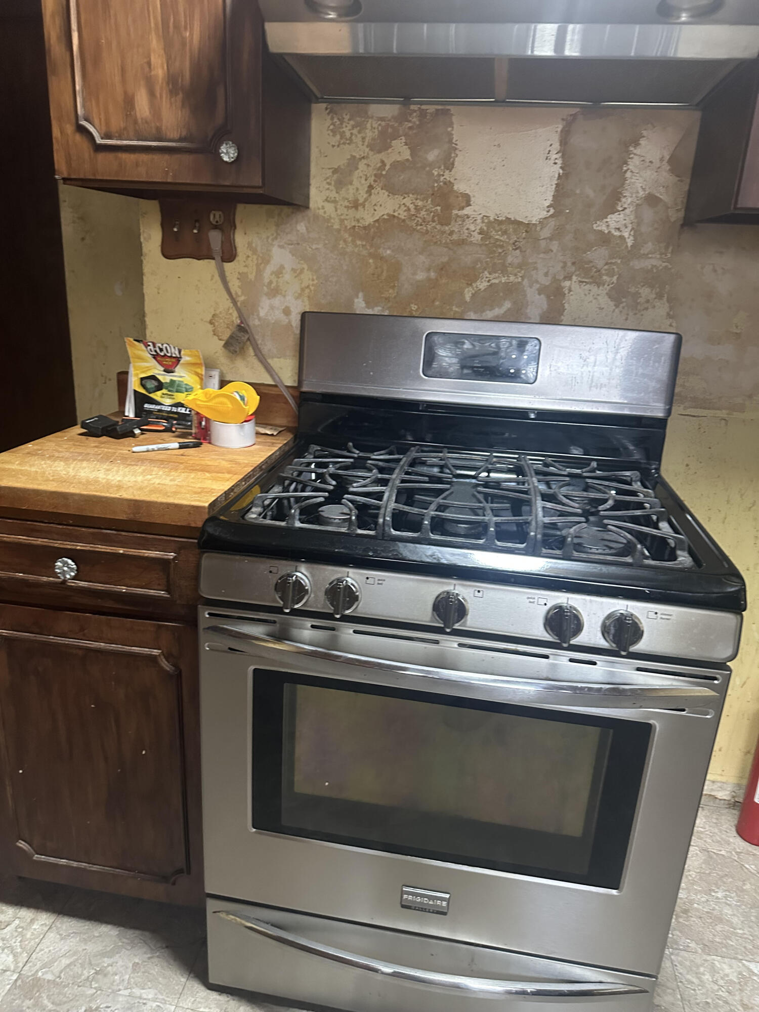 5489 Clem Road Portage, IN 46368 - Photo 32 of 48 a stove top oven sitting inside of a kitchen