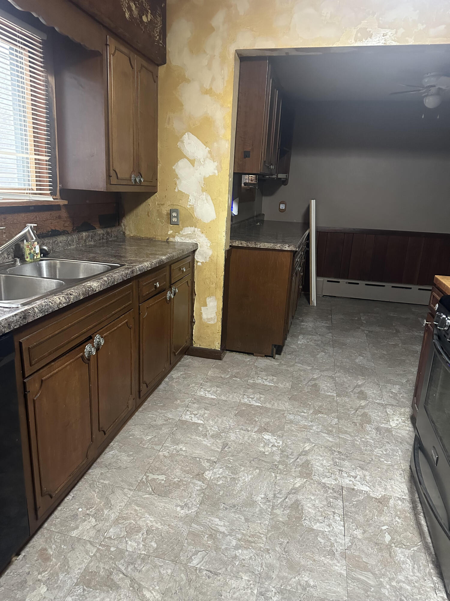 5489 Clem Road Portage, IN 46368 - Photo 33 of 48 a kitchen with a sink and cabinets