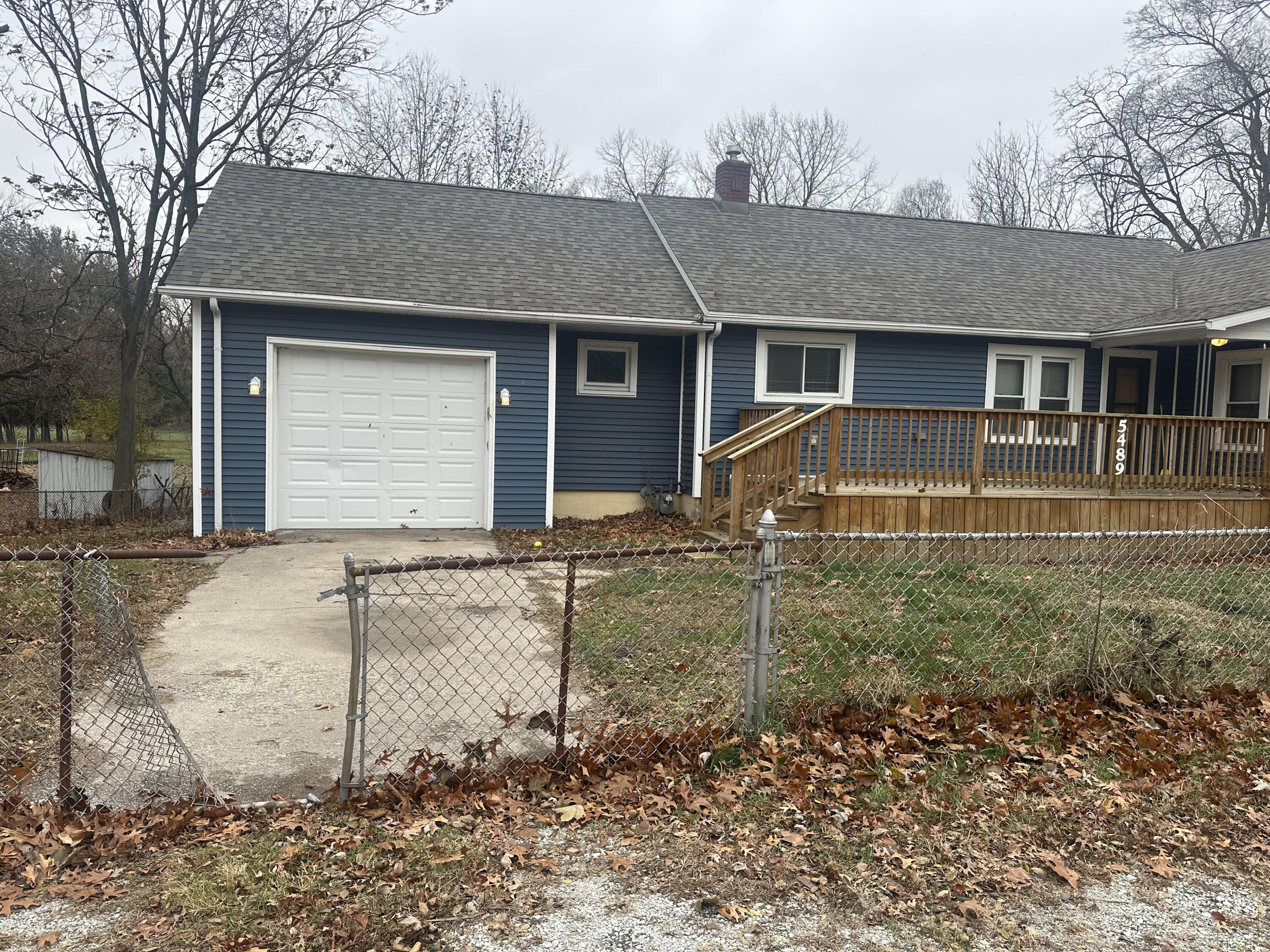 5489 Clem Road Portage, IN 46368 - Photo 9 of 48 a view of a house with a yard
