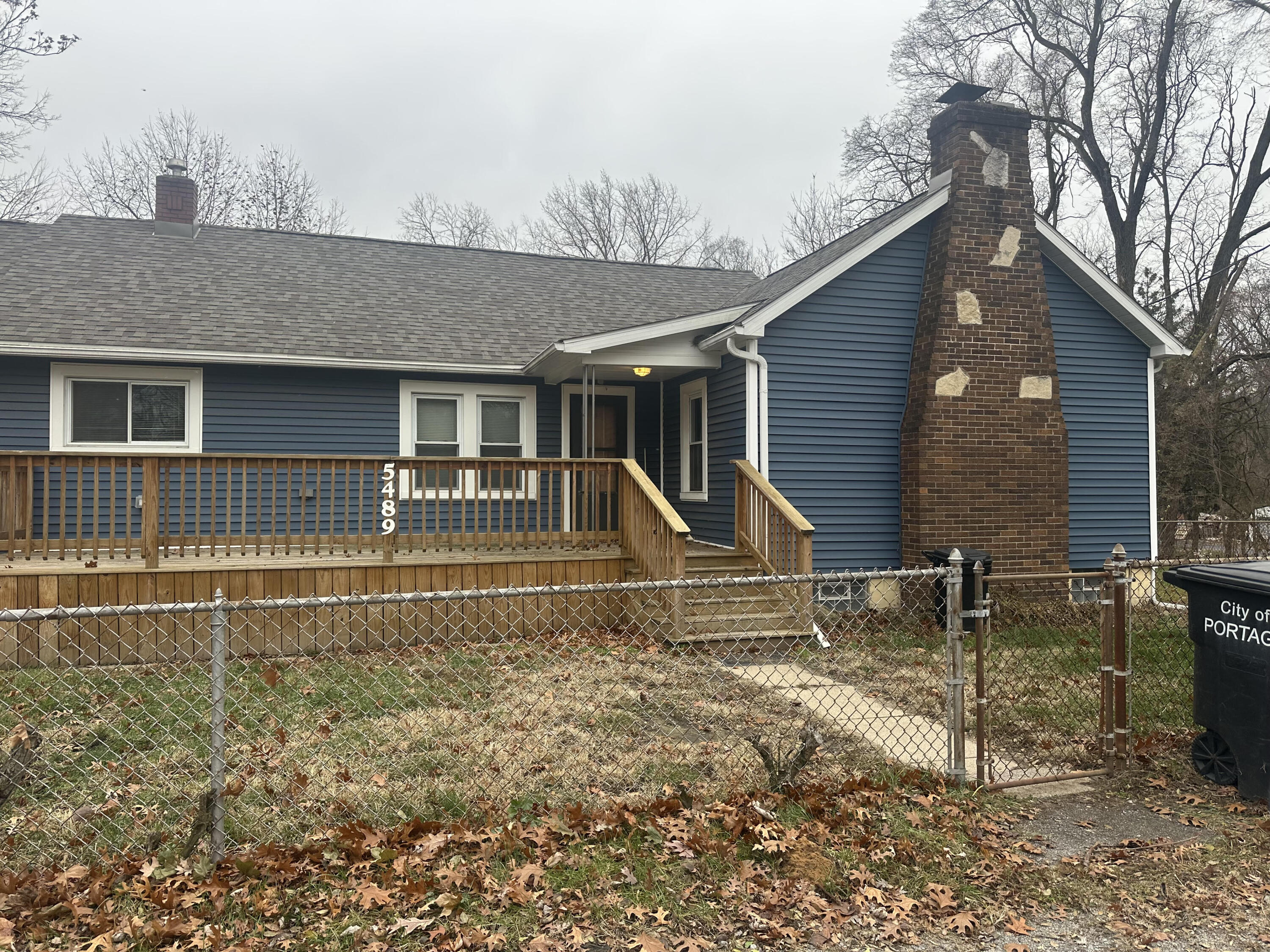 5489 Clem Road Portage, IN 46368 - Photo 10 of 48 a house view with a backyard space