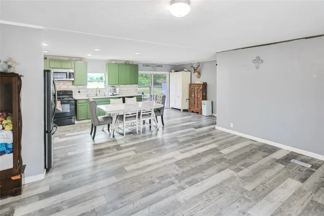 a view of a dining room with furniture