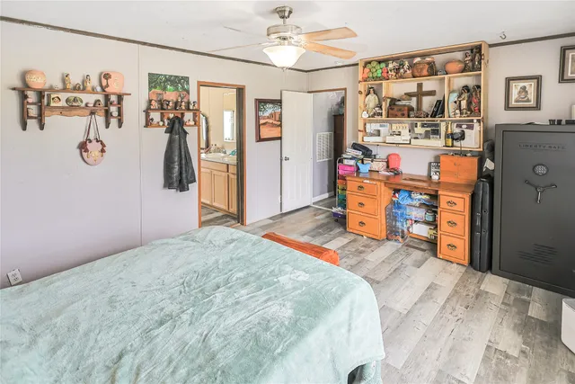 a bedroom with a bed and a walk in closet