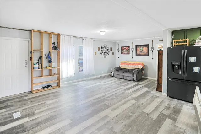 a room with a bed and furniture