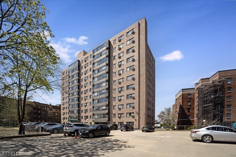90 Prospect Avenue Hackensack, NJ 07601 - Photo 12 of 21 a city street lined with tall buildings