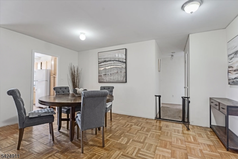 90 Prospect Avenue Hackensack, NJ 07601 - Photo 4 of 21 a view of a dining room with furniture