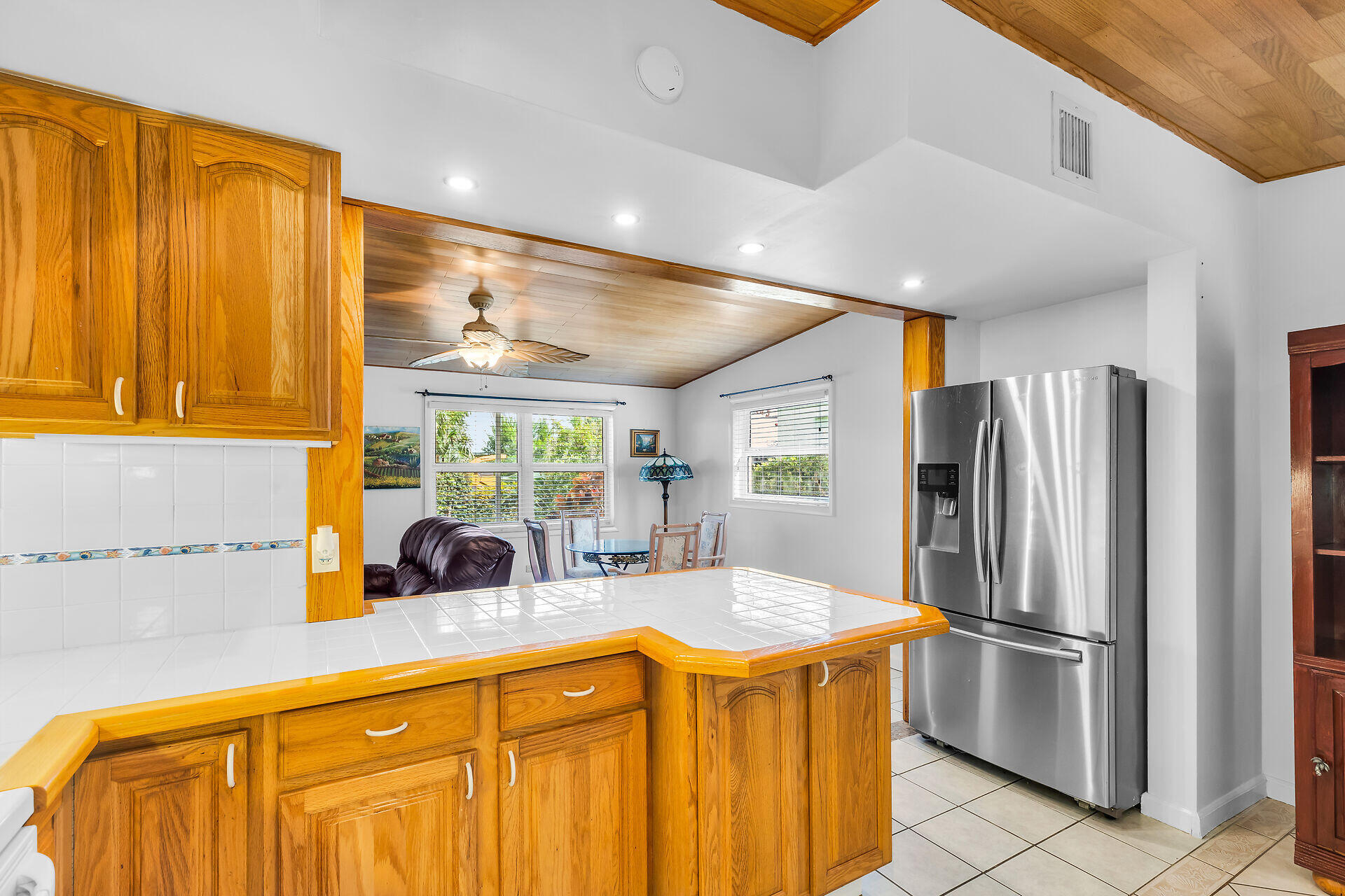 13 Bass Avenue Key Largo, FL 33037 - Photo 15 of 43 a kitchen with stainless steel appliances granite countertop a refrigerator a sink and a stove