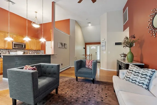 a living room with furniture and a couch