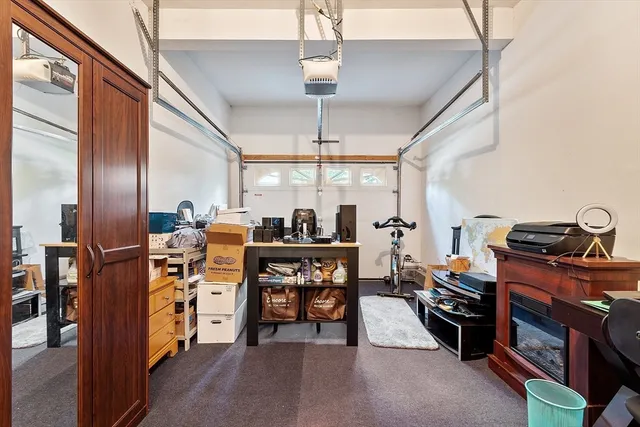 a room with lots of chairs and mirrors