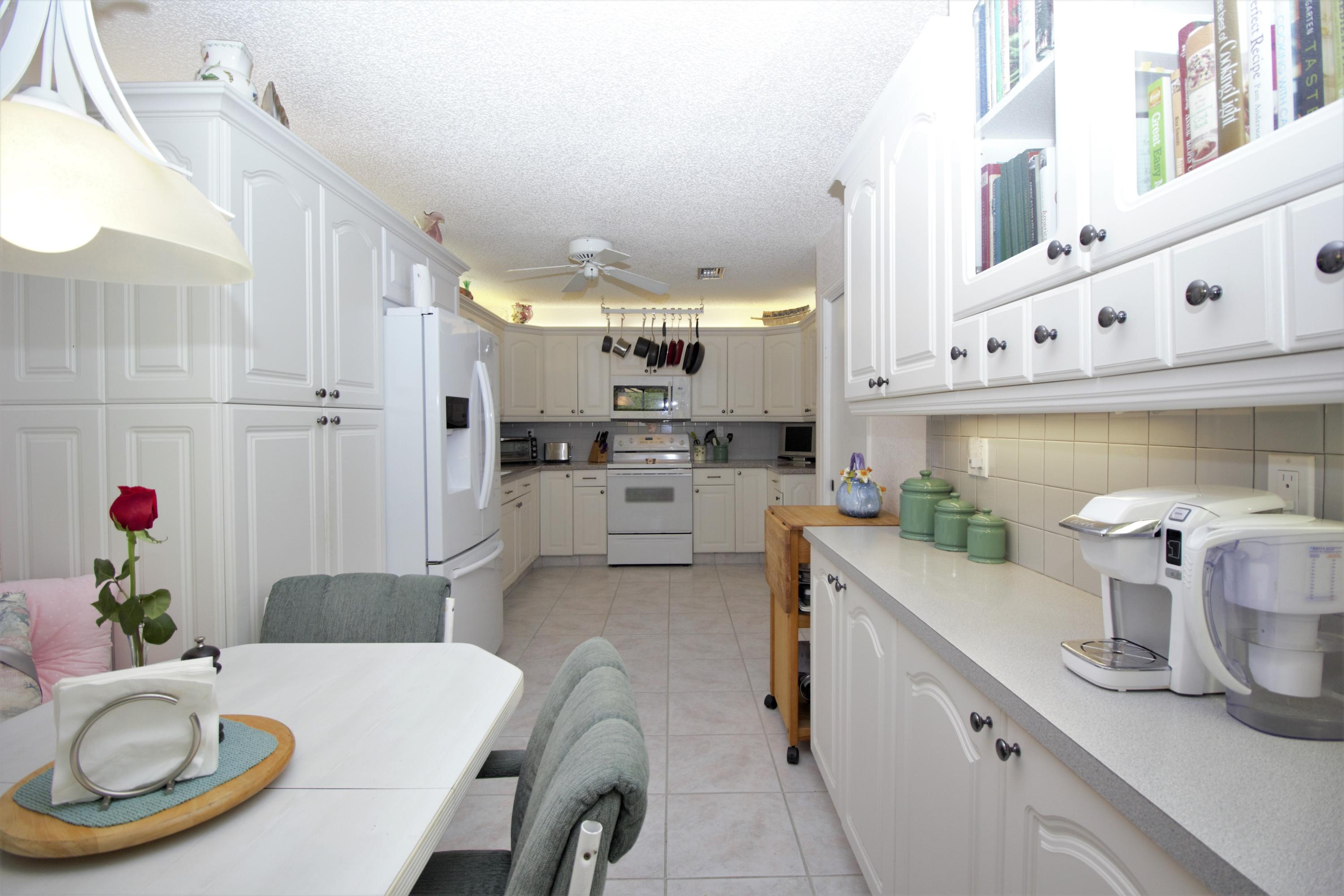 7764 Cloverfield Circle Boca Raton, FL 33433 - Photo 9 of 34 7764 kitchen 2