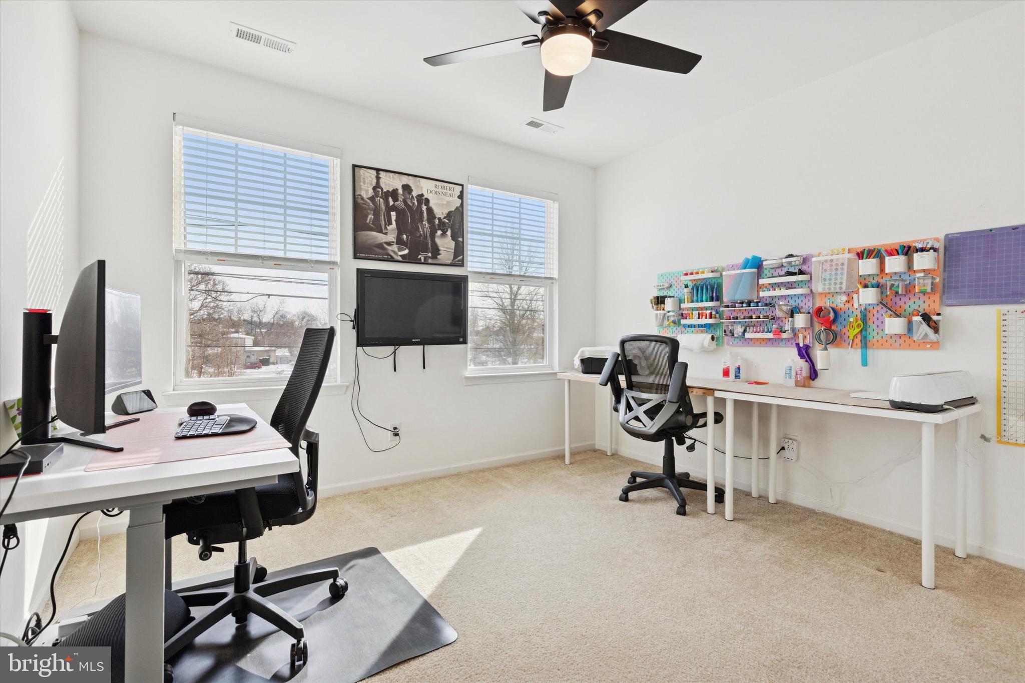 1529 DeKalb Street, Unit 131 Norristown, PA 19401 - Photo 12 of 27 a view of a workspace with furniture and a window