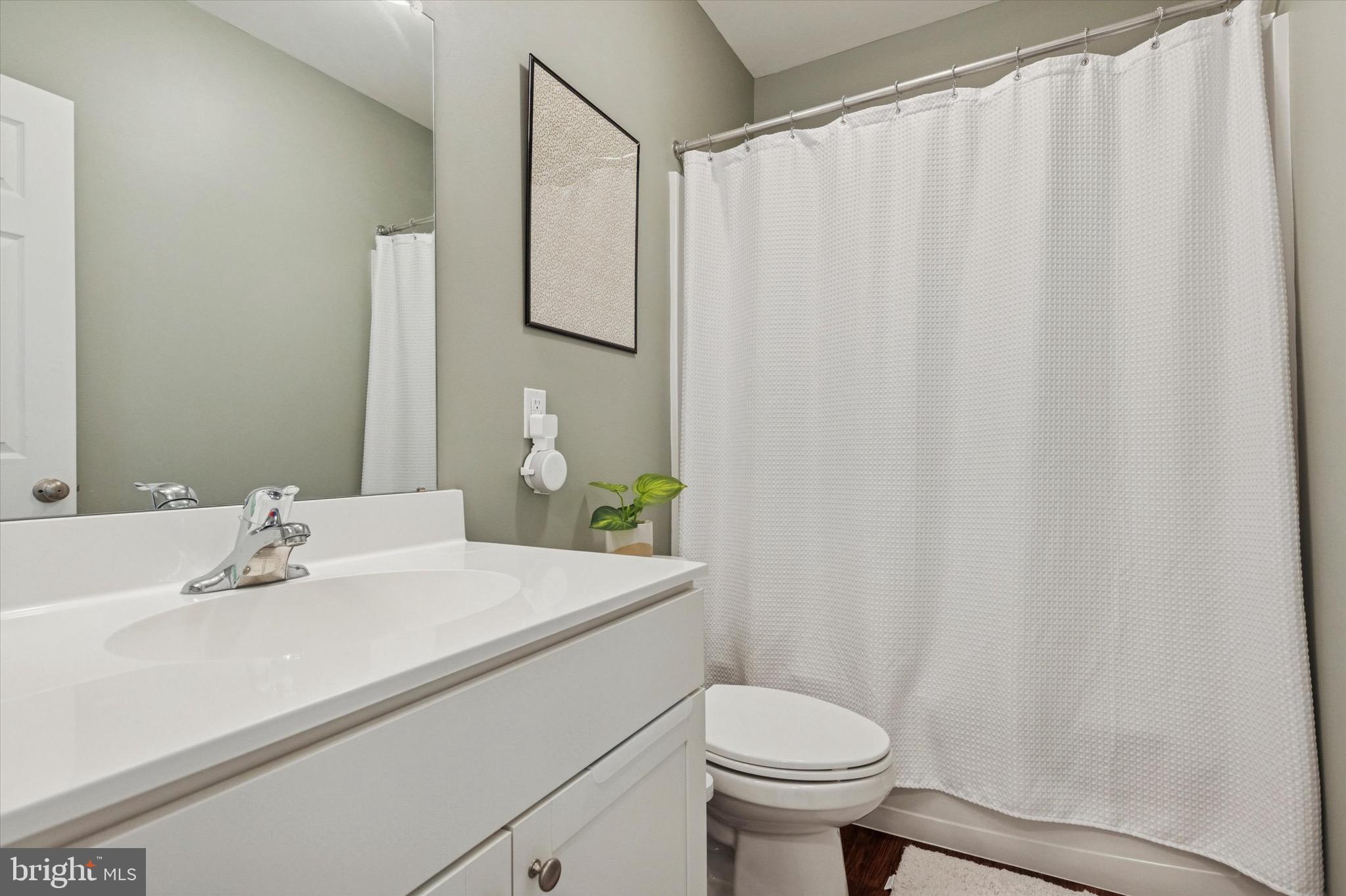 1529 DeKalb Street, Unit 131 Norristown, PA 19401 - Photo 15 of 27 a bathroom with a sink and a toilet