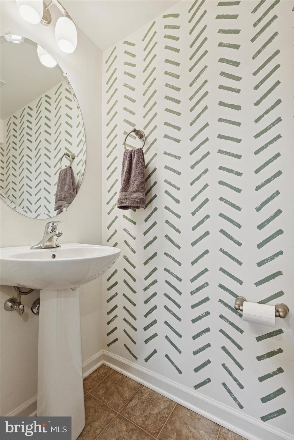 1529 DeKalb Street, Unit 131 Norristown, PA 19401 - Photo 23 of 27 a bathroom with a sink and a mirror