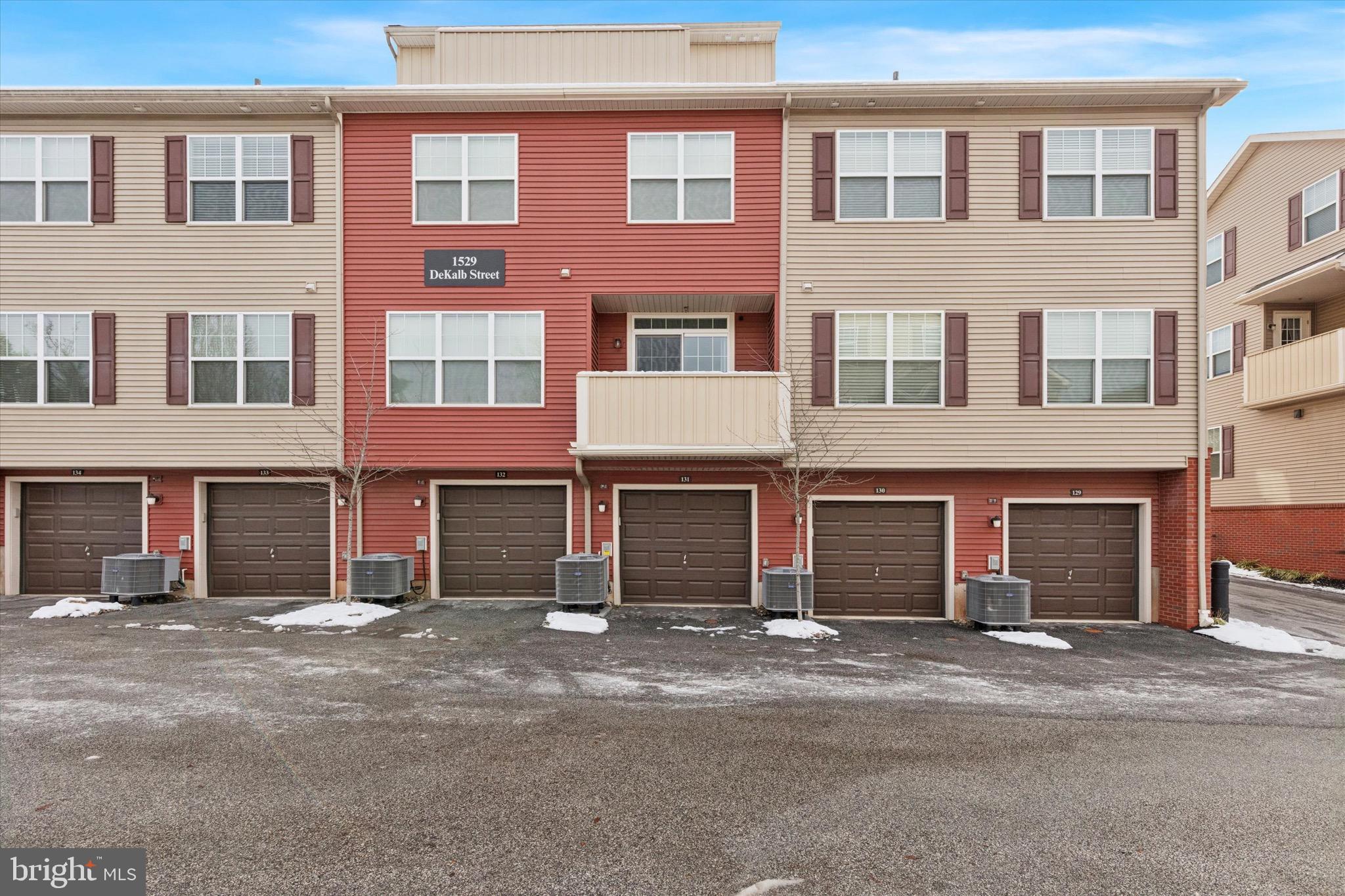 1529 DeKalb Street, Unit 131 Norristown, PA 19401 - Photo 25 of 27 a front view of a house with a road