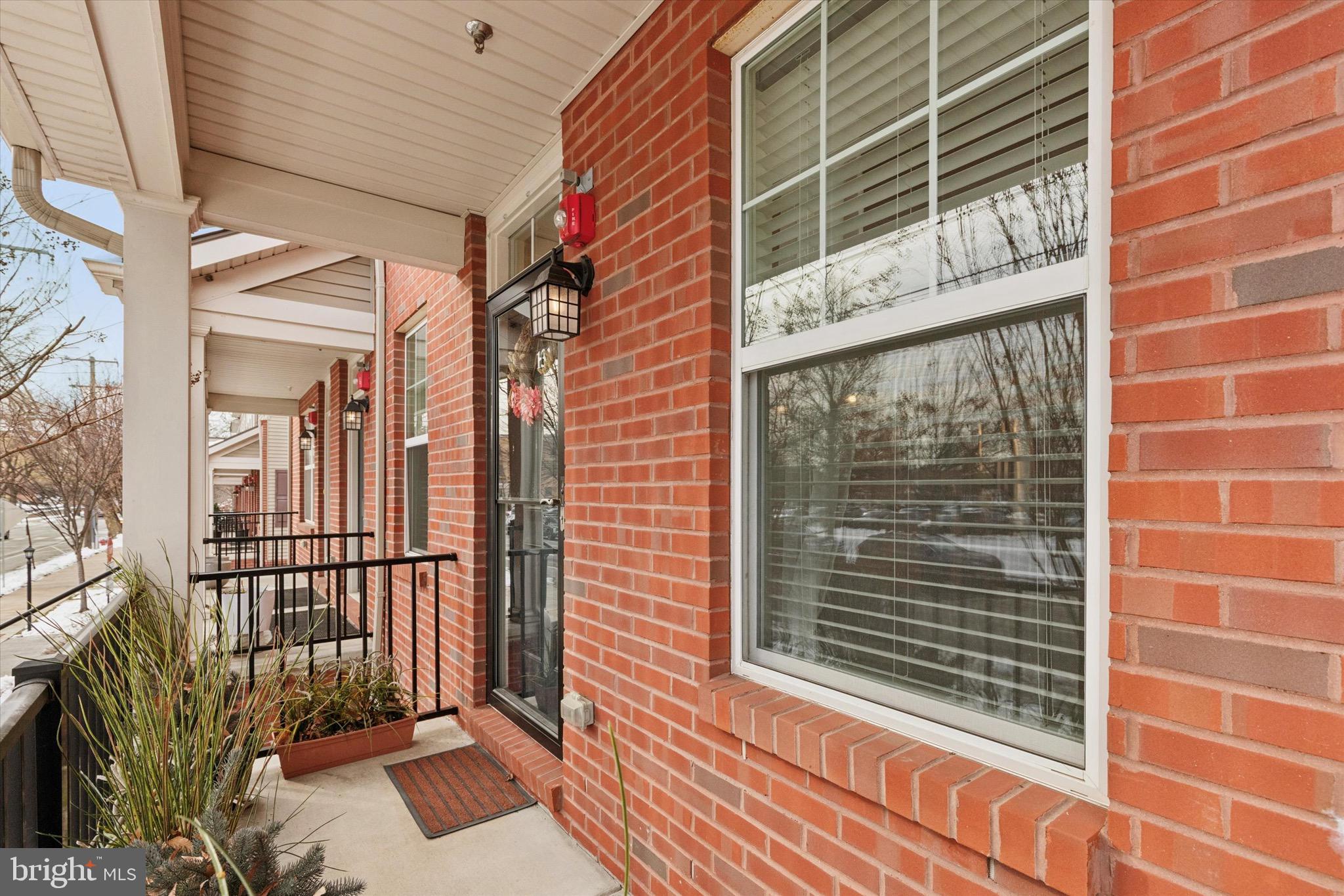1529 DeKalb Street, Unit 131 Norristown, PA 19401 - Photo 3 of 27 a view of a brick house with a large window