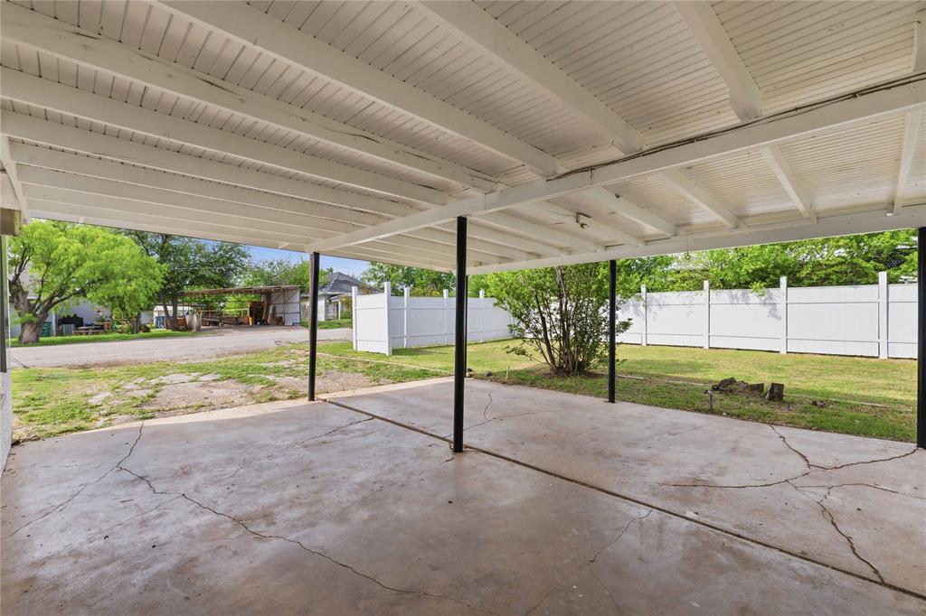516 South Pecos Street Coleman, TX 76834 - Photo 21 of 32 a view of a backyard with porch