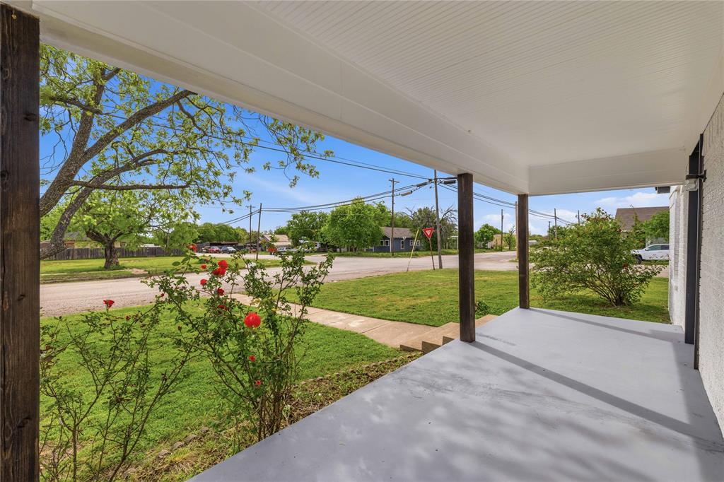 516 South Pecos Street Coleman, TX 76834 - Photo 25 of 32 a view of a garden with an outdoor seating