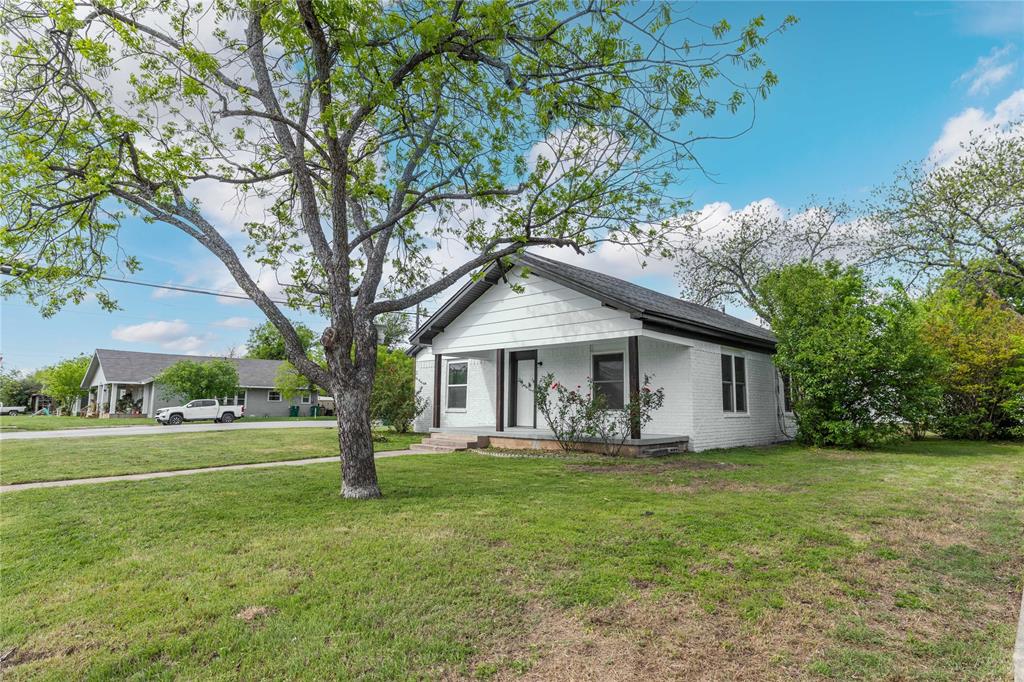 516 South Pecos Street Coleman, TX 76834 - Photo 26 of 32 a view of a house with a yard